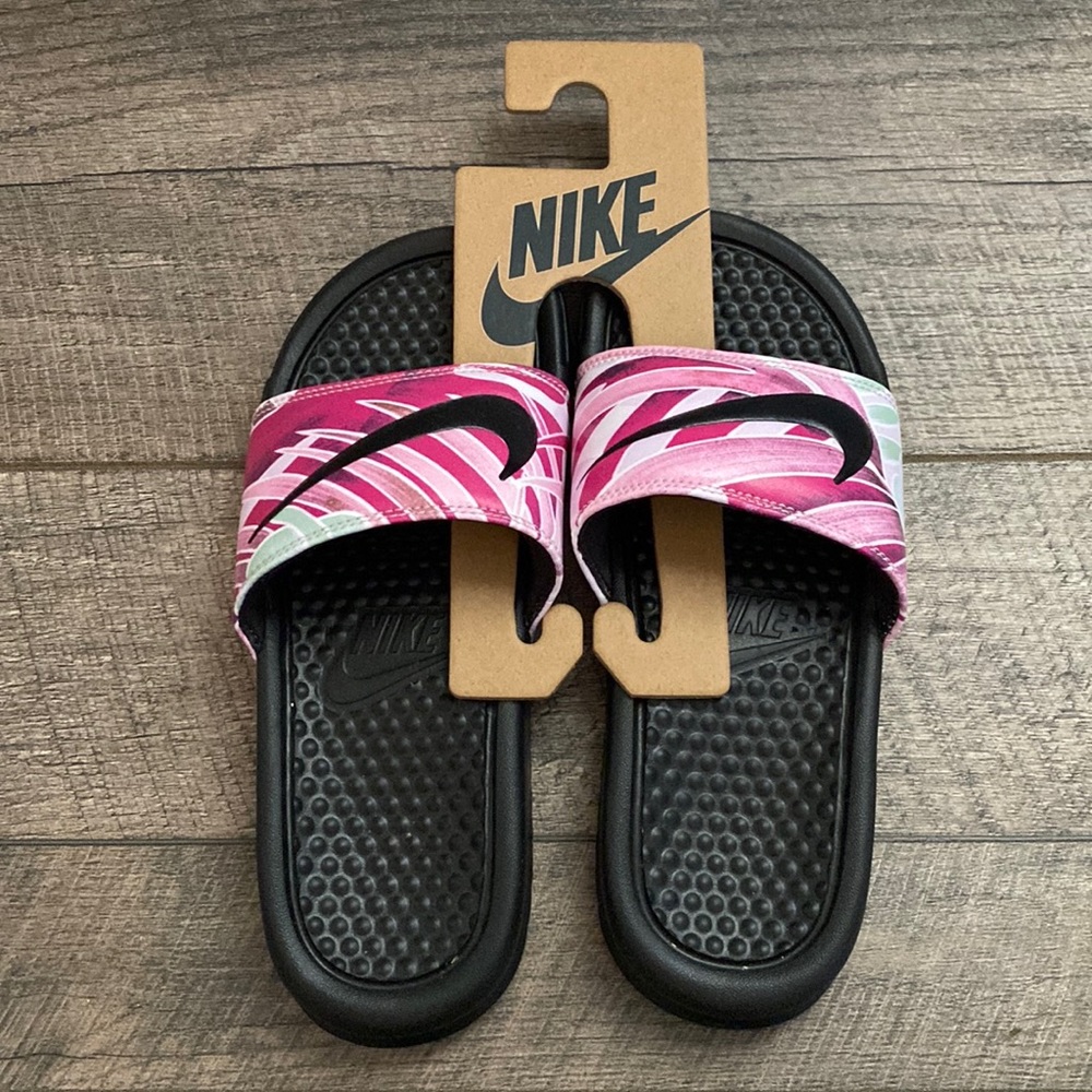 Size 5 black and pink Nike slides